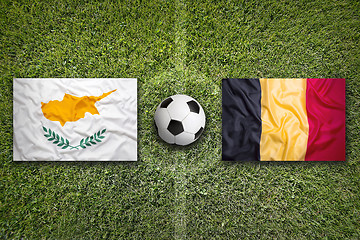 Image showing Cyprus vs. Belgium flags on soccer field