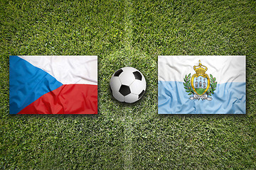 Image showing Czech Republic vs. San Marino flags on soccer field