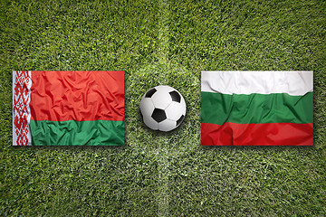 Image showing Belarus vs. Bulgaria flags on soccer field