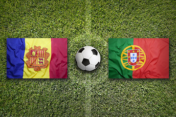 Image showing Andorra vs. Portugal flags on soccer field