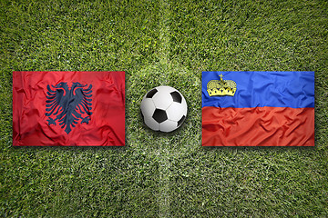 Image showing Albania vs. Liechtenstein flags on soccer field