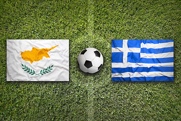 Image showing Cyprus vs. Greece flags on soccer field