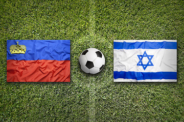 Image showing Liechtenstein vs. Israel flags on soccer field