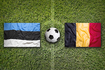 Image showing Estonia vs. Belgium flags on soccer field