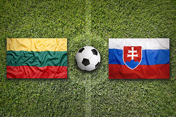 Image showing Lithuania vs. Slovakia flags on soccer field