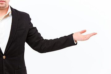 Image showing Dressed in a business suit caucasian male hand