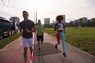 Image showing multiethnic group of people on the jogging