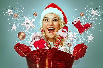 Image showing Beautiful young woman in Santa Claus clothes