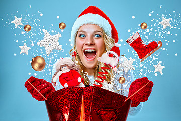 Image showing Beautiful young woman in Santa Claus clothes