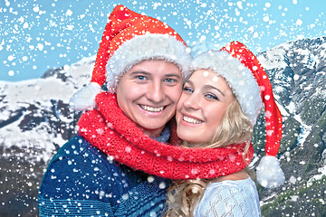 Image showing Lovely christmas couple in Santa Claus hats