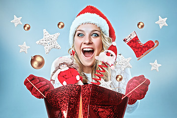 Image showing Beautiful young woman in Santa Claus clothes