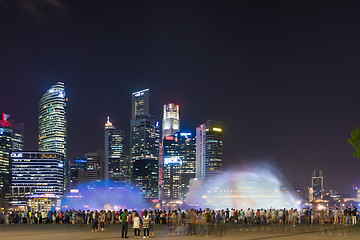 Image showing  Marina Bay Sands at night during Light and Water Show \'Wonder F