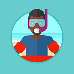 Image showing Man with snorkeling equipment on the beach.