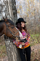 Image showing Young Woman And Horse