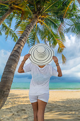 Image showing portrait of young pretty woman looking to the ocean 