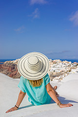 Image showing Young woman on holidays, Santorini Oia town 