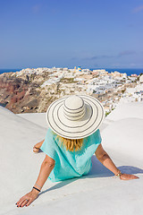 Image showing Young woman on holidays, Santorini Oia town 