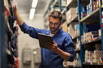 Image showing auto mechanic or smith with tablet pc at workshop