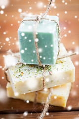 Image showing close up of handmade soap bars on wood