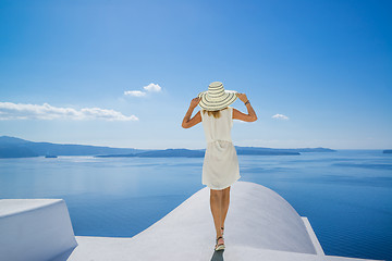 Image showing Young woman on holidays, Santorini Oia town 