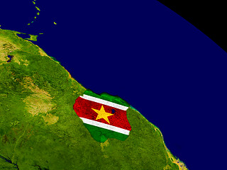 Image showing Suriname with flag on Earth