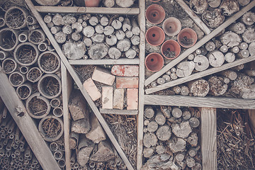 Image showing Wood and pots on a shelf