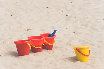 Image showing Kids toys in a sandbox