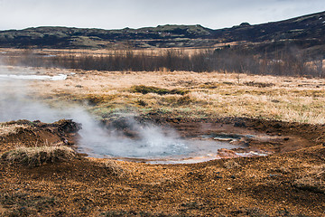 Image showing Boiling water in a puddle