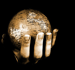 Image showing Globe in a girl's hands