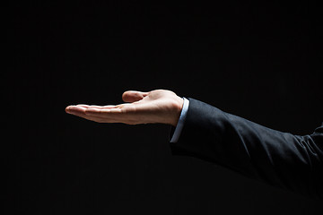 Image showing close up of businessman with empty hand