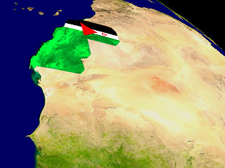 Image showing Western Sahara with flag on Earth
