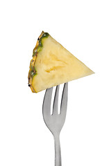 Image showing Slice of pineapple on a fork