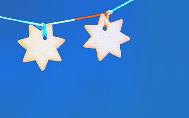 Image showing Blue Greeting Background With Gingerbread