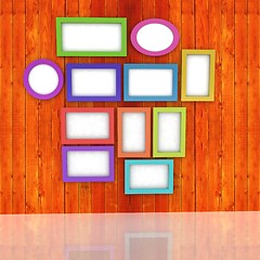 Image showing Mock up picture frames on wood wall. 3d illustration