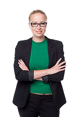 Image showing Business woman standing with arms crossed against white background..