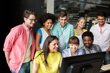 Image showing international students with computers at library