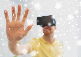 Image showing young man in virtual reality headset or 3d glasses