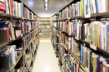 Image showing bookshelves with books at school library