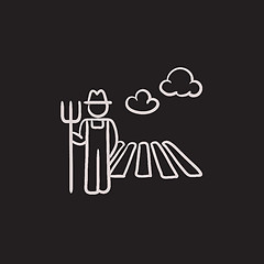 Image showing Farmer with pitchfork at field sketch icon.