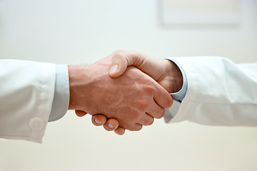 Image showing close up of doctors hands making handshake