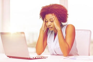 Image showing african woman with laptop at office