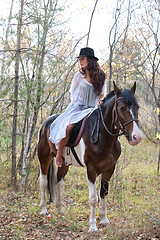 Image showing Young Woman And Horse