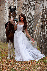 Image showing Young Woman And Horse