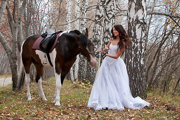 Image showing Young Woman And Horse