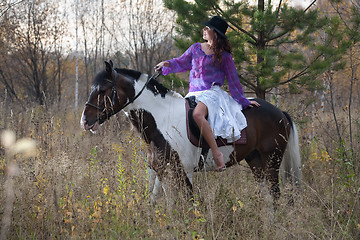 Image showing Young Woman And Horse