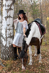 Image showing Young Woman And Horse