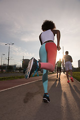 Image showing multiethnic group of people on the jogging