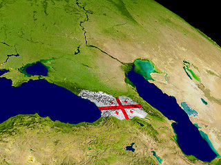 Image showing Georgia with flag on Earth