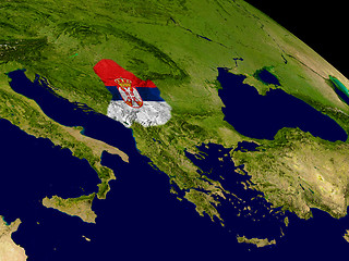 Image showing Serbia with flag on Earth