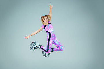 Image showing The group of girls, jumping on kangoo training